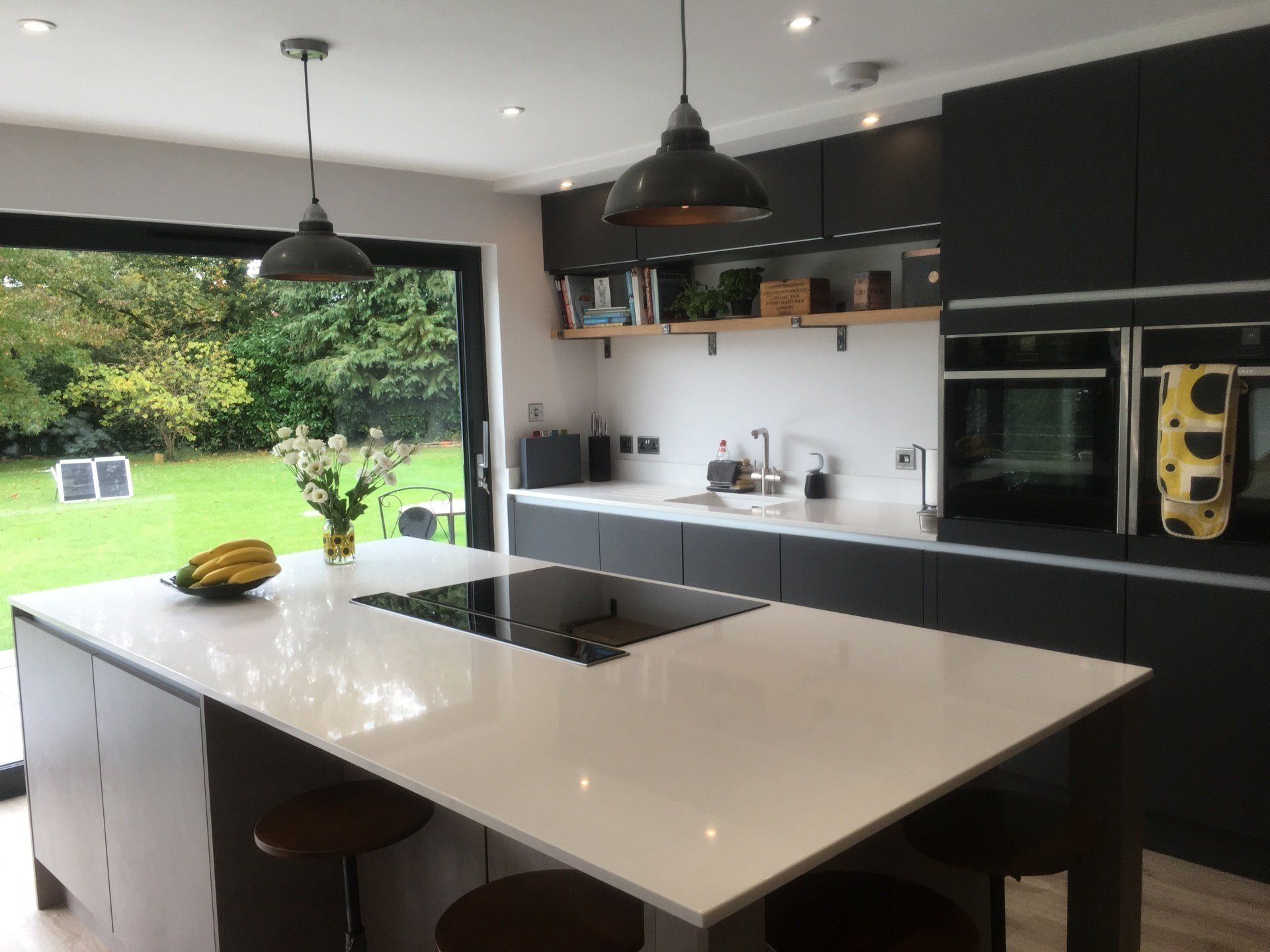 Modern concrete & charcoal family kitchen for Nicki Bennet, Newbury, in 2017