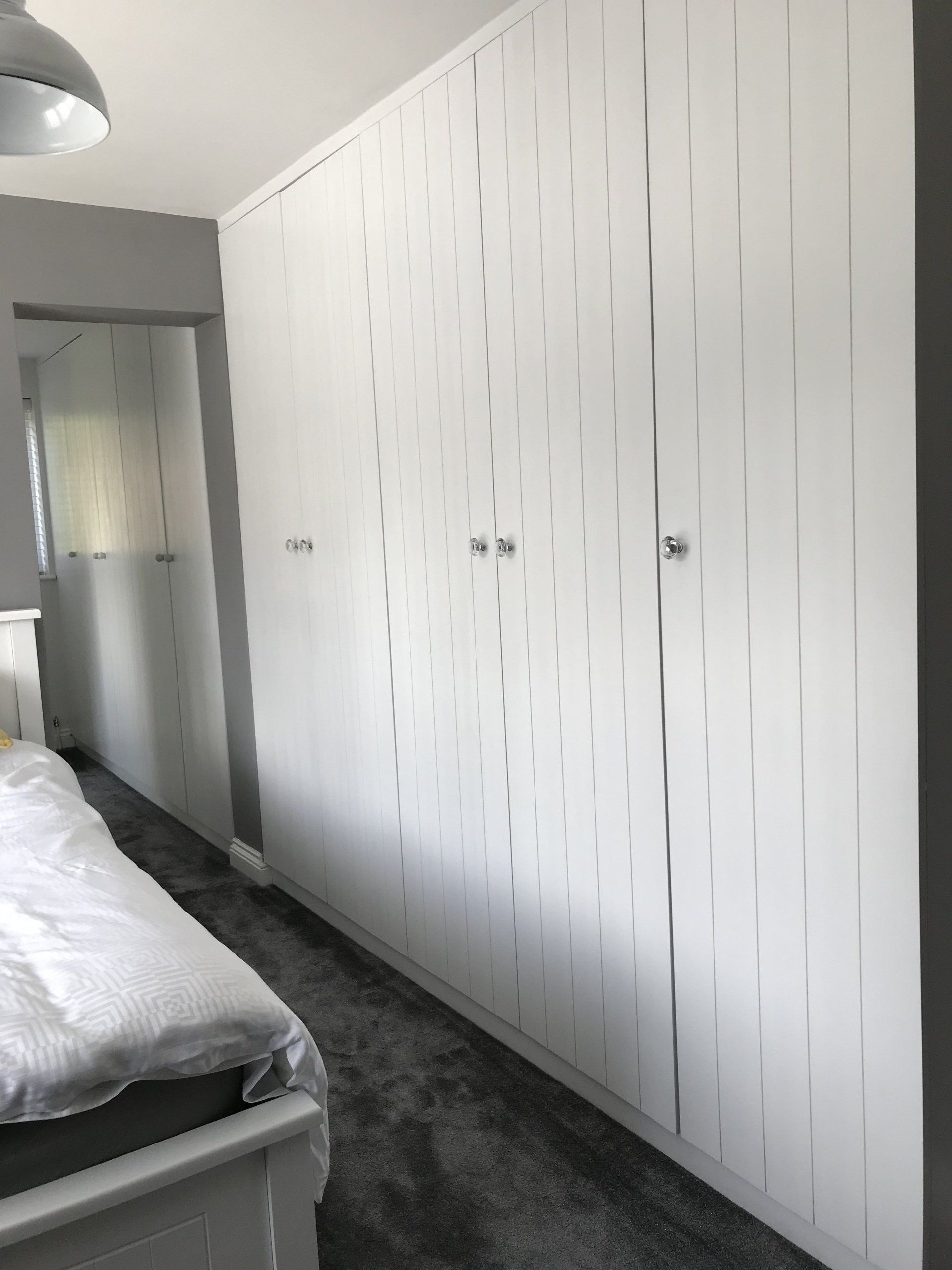 Modern, full height wardrobes completed in Highclere, 2018