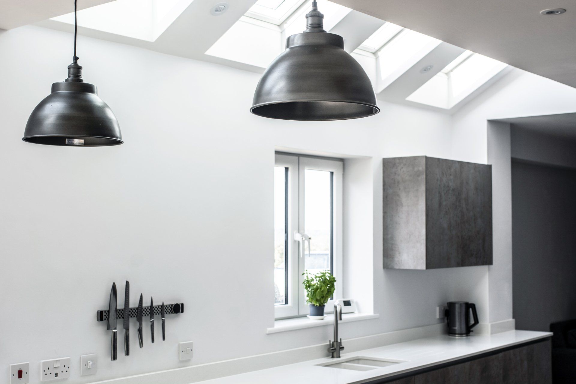 Modern concrete kitchen and dining room completed in 2017
