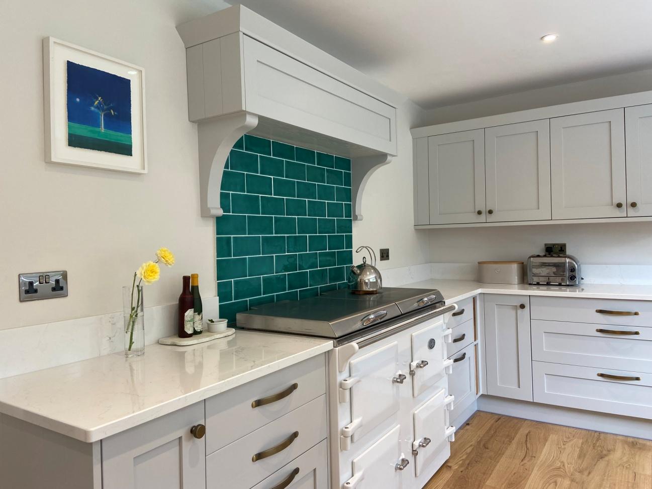 Shaker kitchen with bespoke hood and splashback
