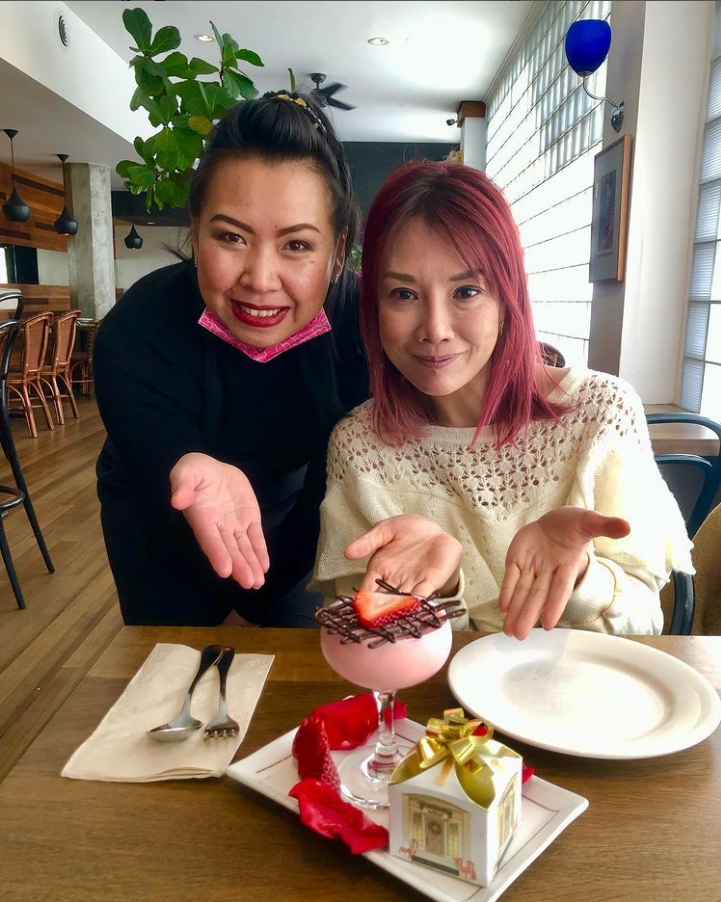 Server presenting a special cocktail for Valentine’s Day.