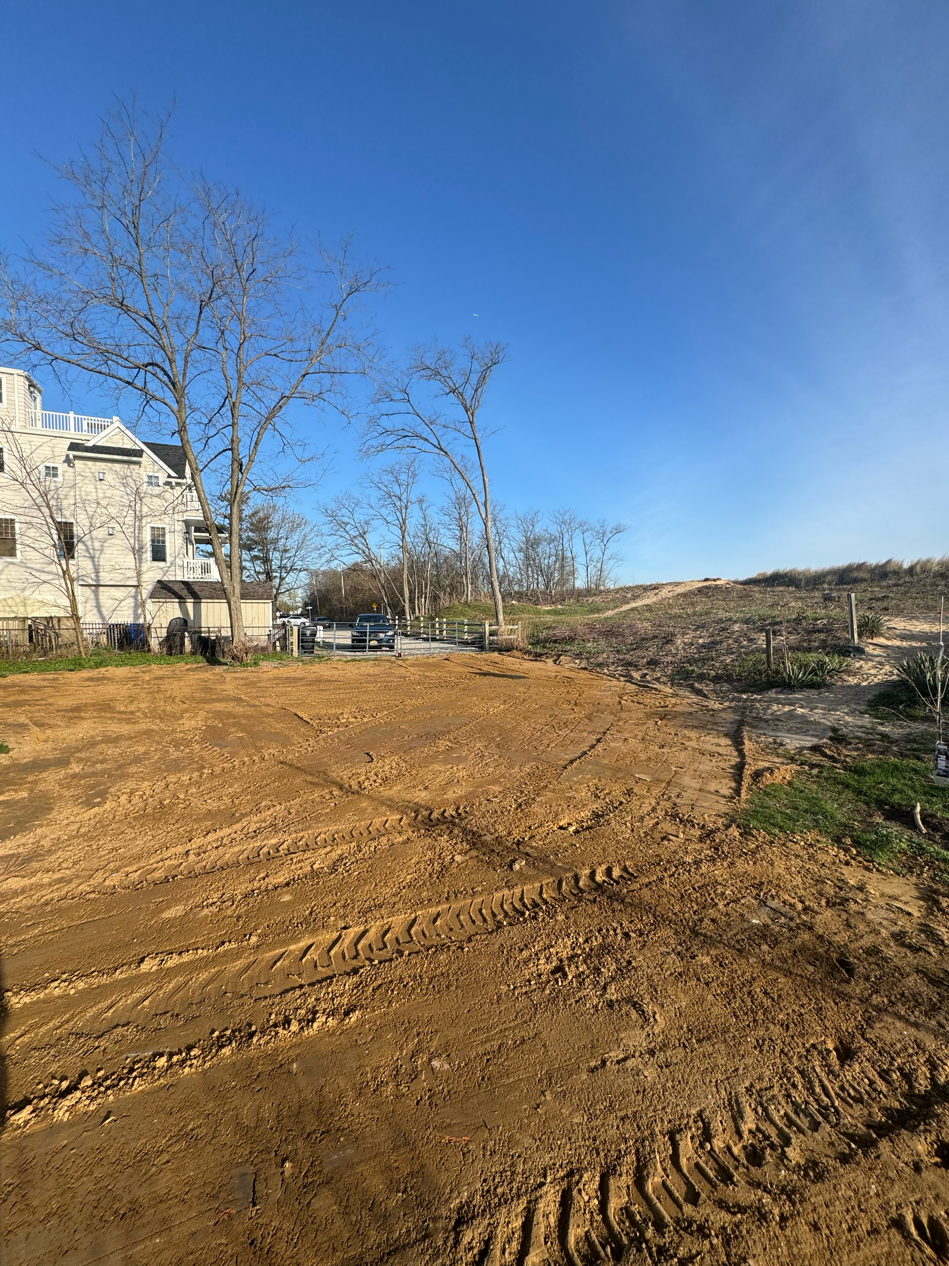 Open land being leveled and graded in preparation for construction and infrastructure projects.
