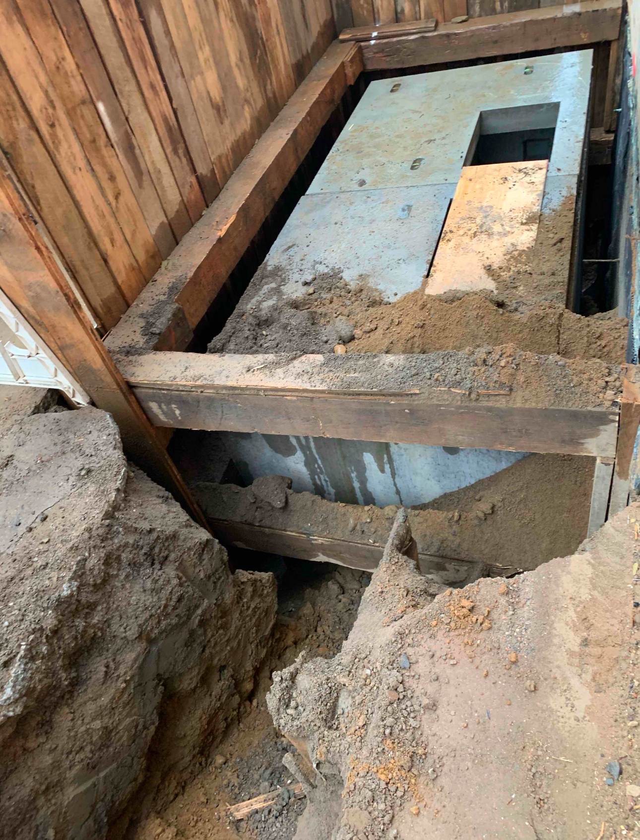 Concrete vault structure under construction for underground utility or stormwater system.