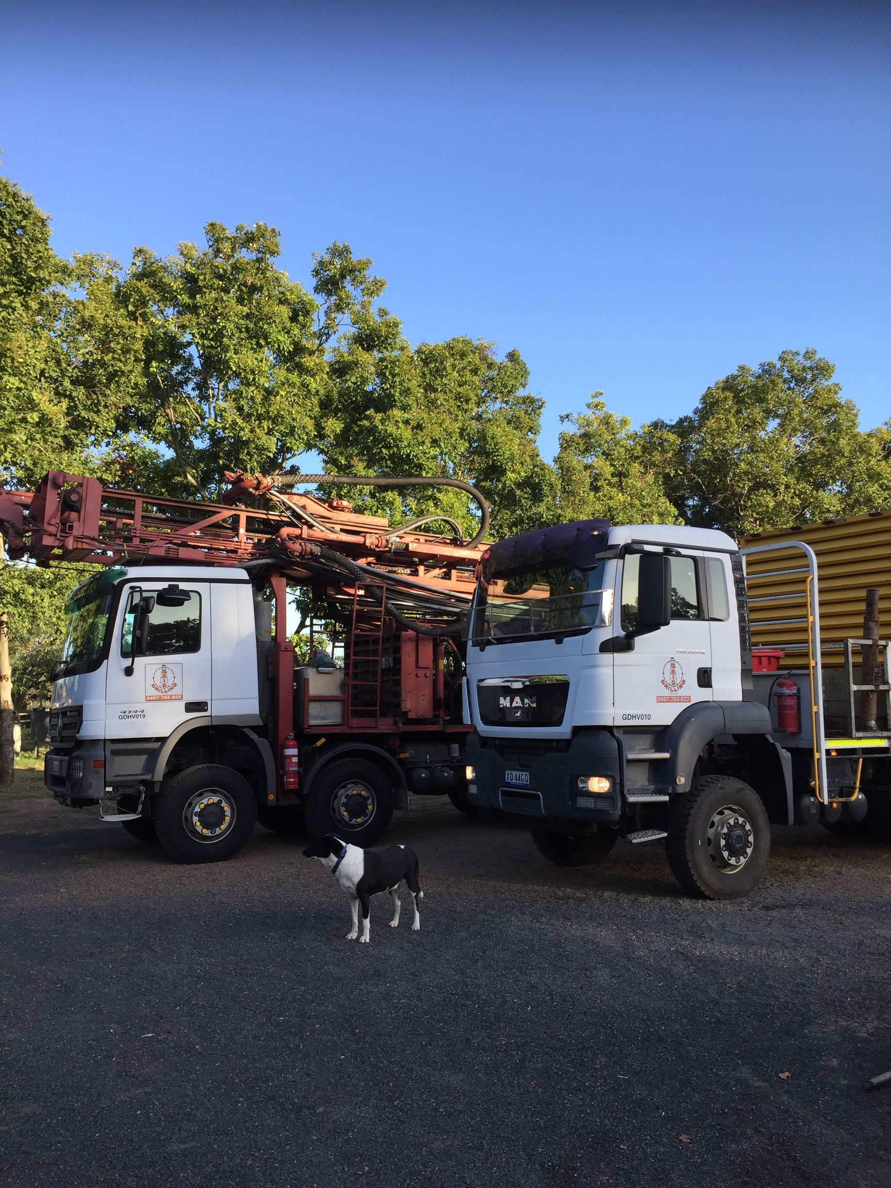 The Operator of the Drilling Rig Cleaning the Machine — Grid Drilling in Bucca, QLD