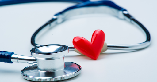 Stethoscope with a small red heart symbolizing compassionate, relationship-based concierge healthcar