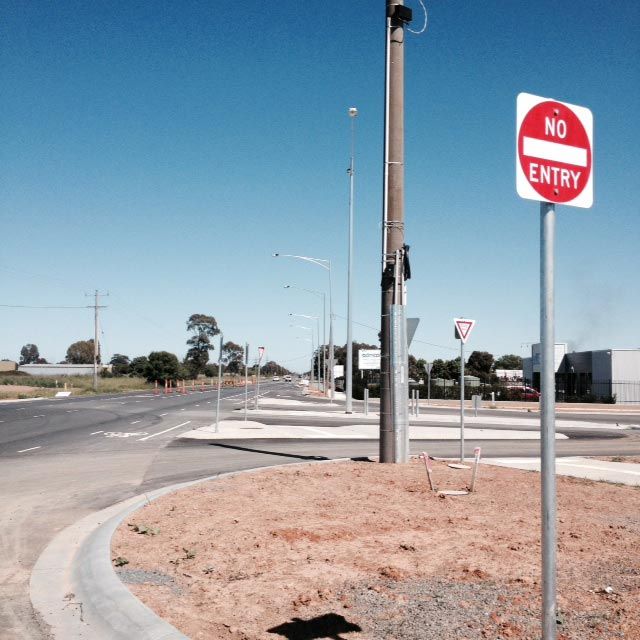 A Red and White no Entry sign on a pole — Mawson Constructions in Kialla, VIC