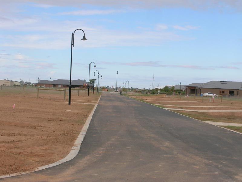 A Street with a lot of Street lights on it — Mawson Constructions in Kialla, VIC