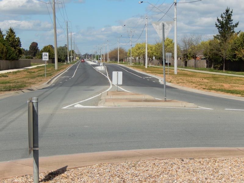A Street with a Sign that says yield on it — Mawson Constructions in Kialla, VIC