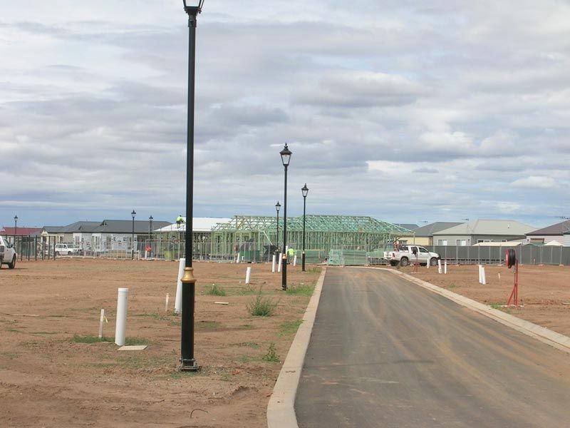 Concrete Drivepath and Lamp Posts — Mawson Constructions in Kialla, VIC