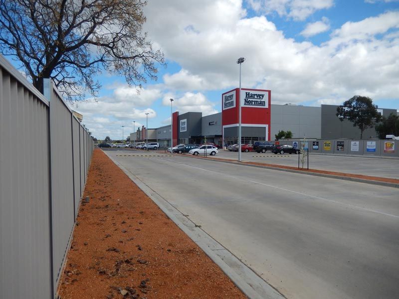 A Large Building with a sign that says kmart on it — Mawson Constructions in Kialla, VIC
