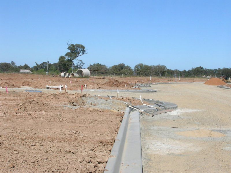 Dirt Road with a Concrete Curb — Mawson Constructions in Kialla, VIC