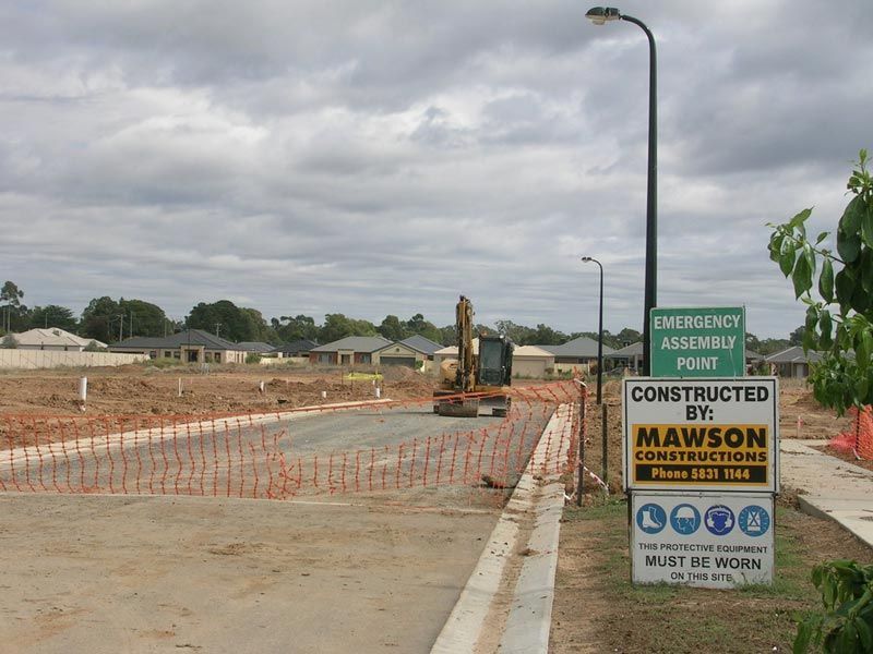 A Construction site with a sign that says Constructed by Mawson — Mawson Constructions in Kialla, VIC