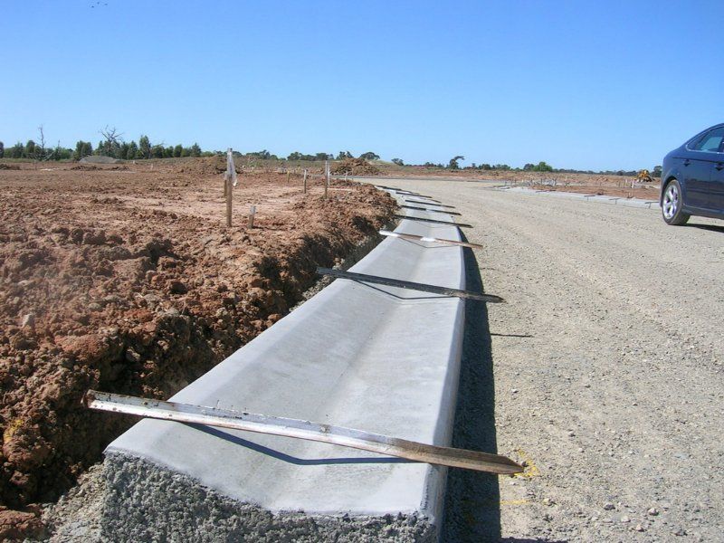 Concrete Water Rain Water Path Way — Mawson Constructions in Kialla, VIC