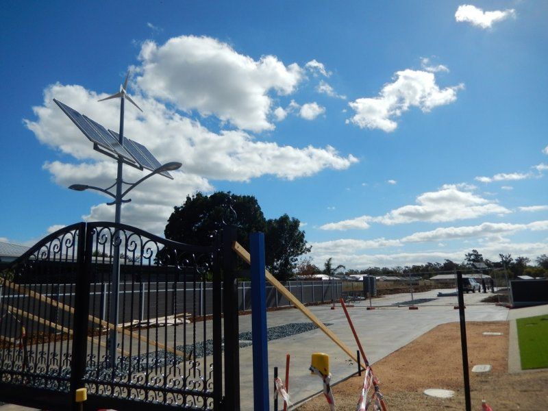 Gate with a Solar Panel on Top — Mawson Constructions in Kialla, VIC