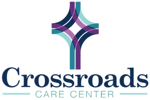 A logo for crossroads care center 