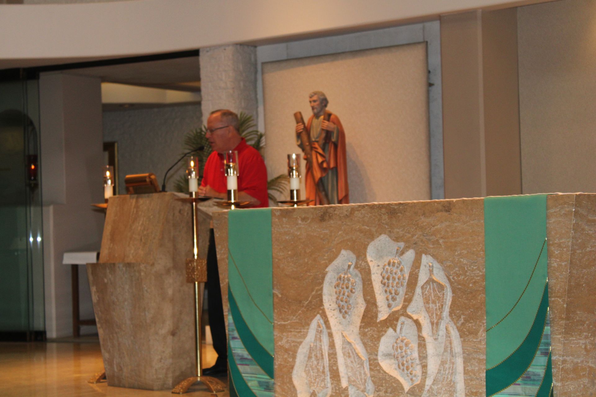 Priest speaking on consecration to the Sacred Hearts