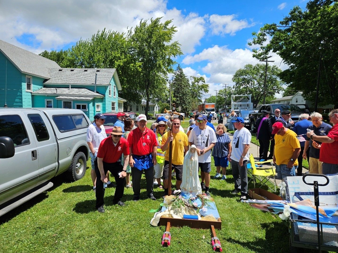 The Men of the Sacred Hearts participates in the 2024 Fish Fly Parade.