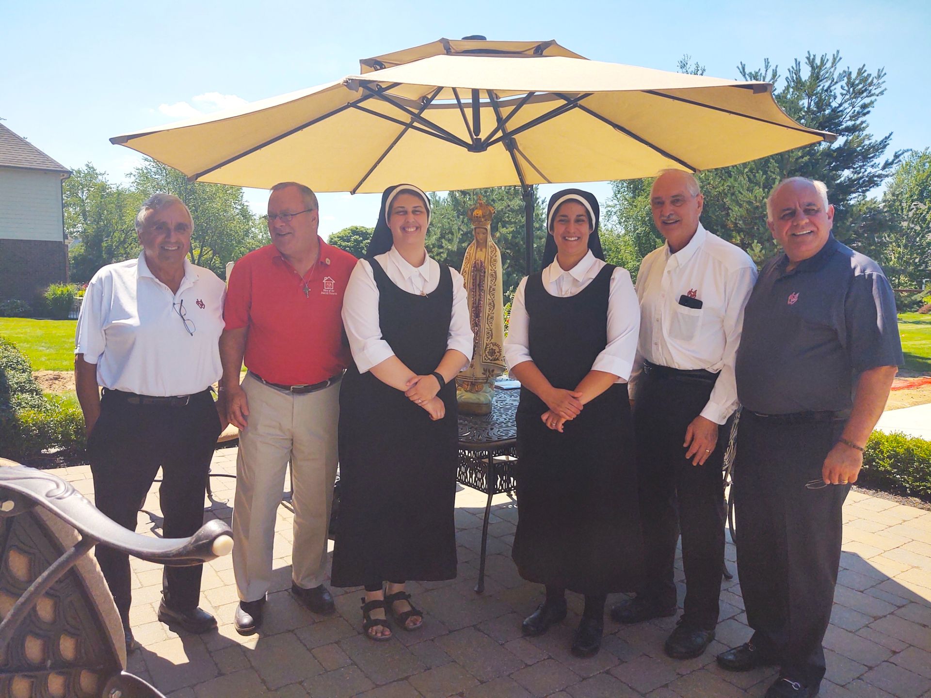 Nuns and men of the sacred hearts