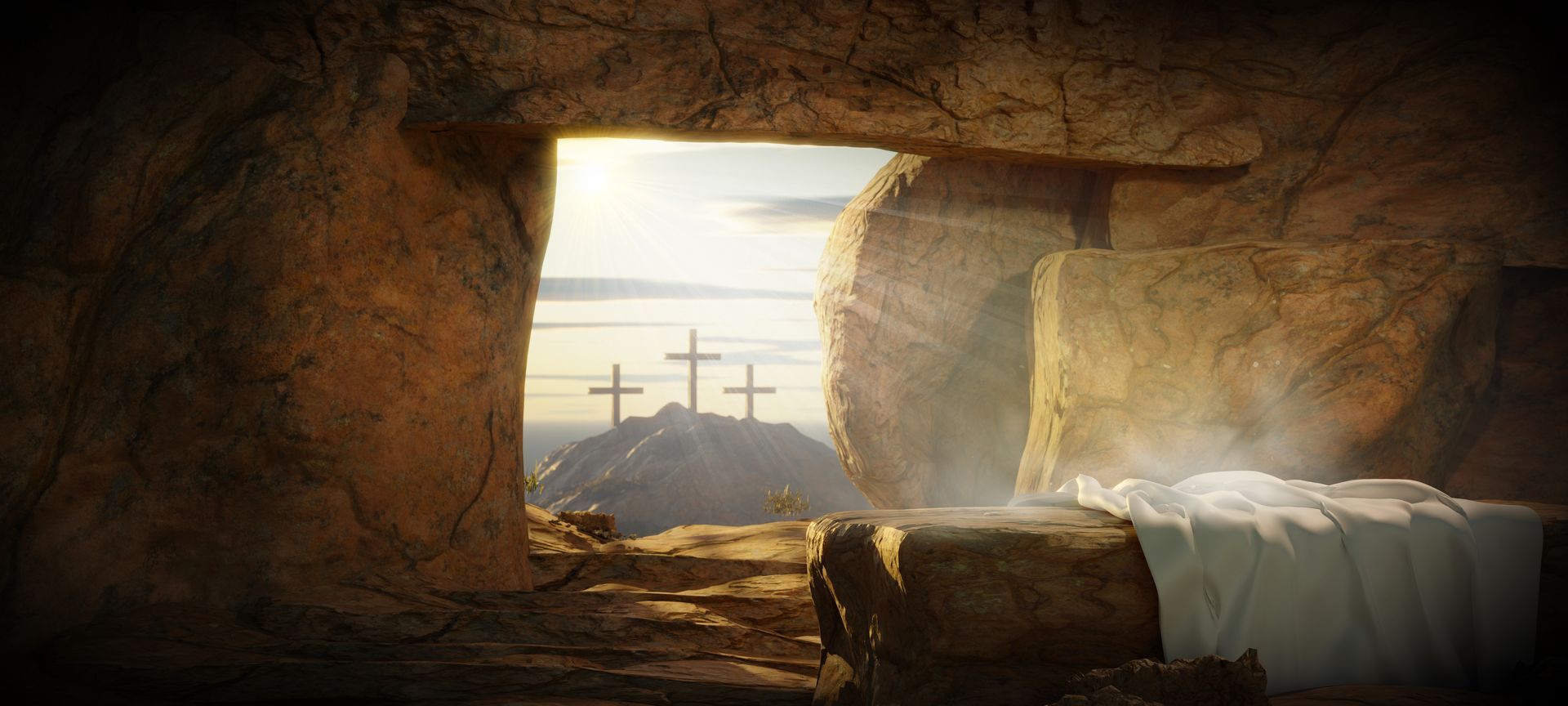 The empty tomb of jesus with three crosses in the background, the Ressurection