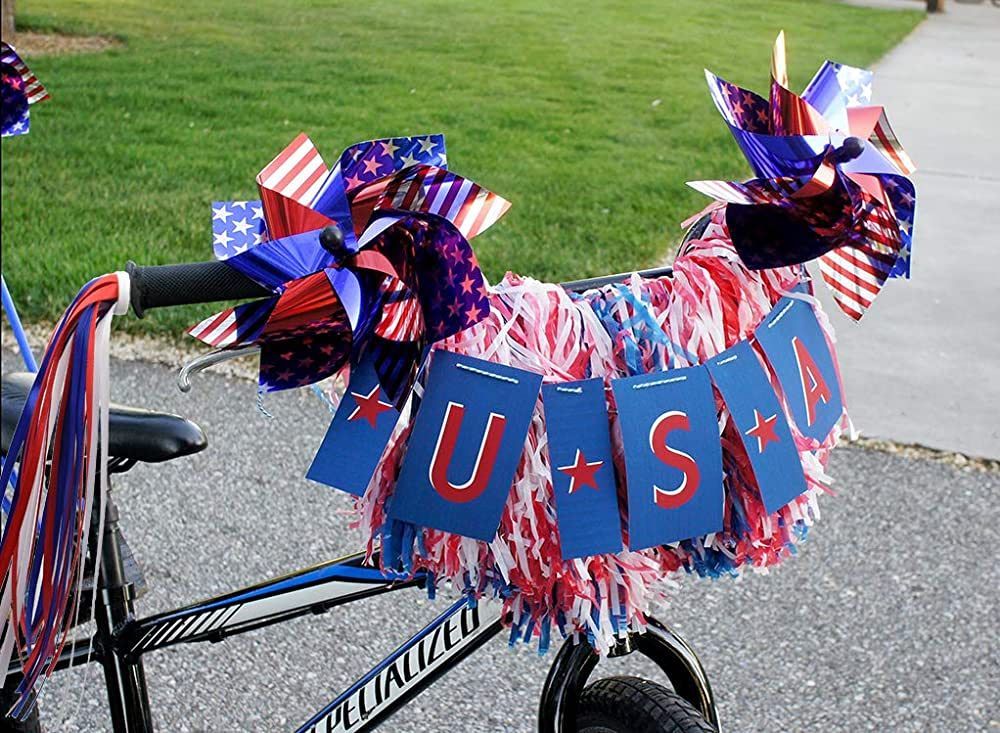 A bicycle with a banner that says usa on it