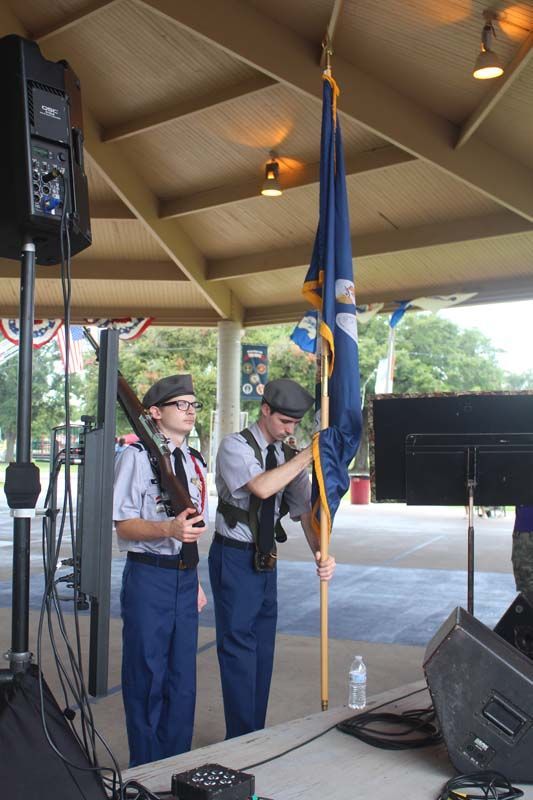 Thibodaux High School JROTC students post the Louisiana flag