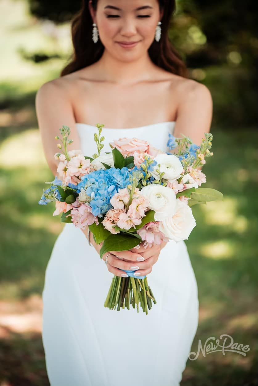 Married Couple Kisses in Front of A Charming Barrel Wall — Tabernacle, NJ — Bees & Blooms