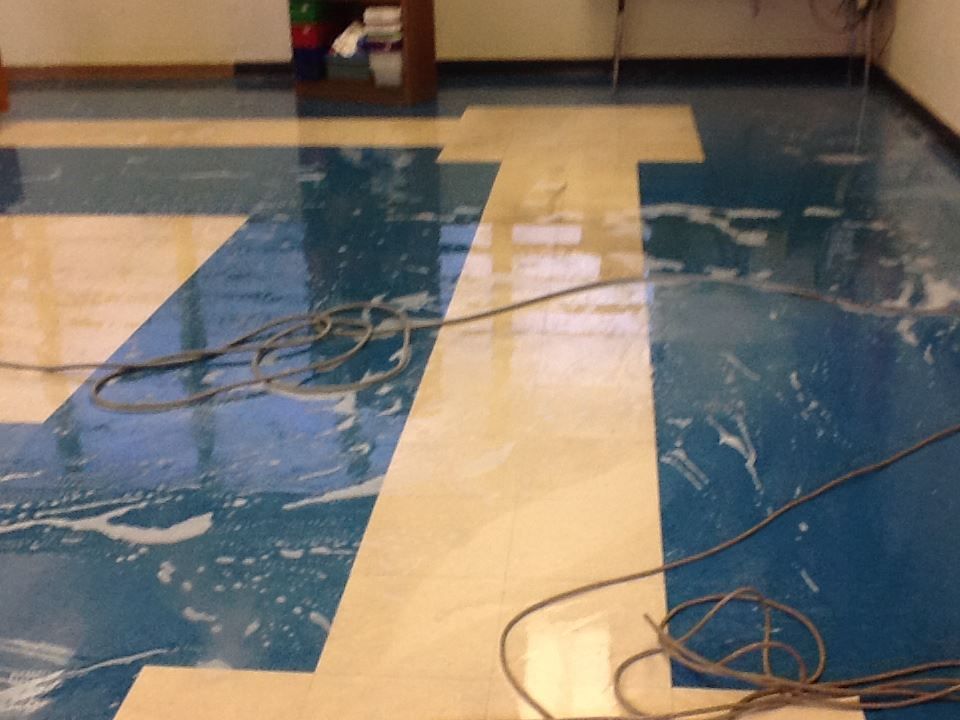 A blue and white tile floor with a number 41 on it