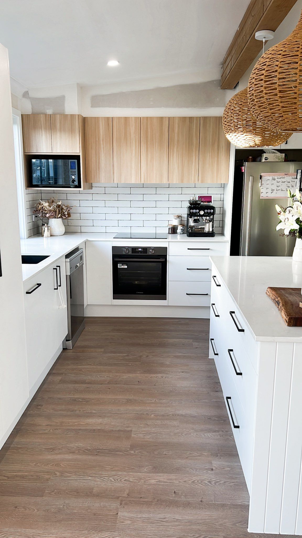 A Kitchen With White Cabinets — The Kitchen & Bathroom Doctor in Medowie, NSW