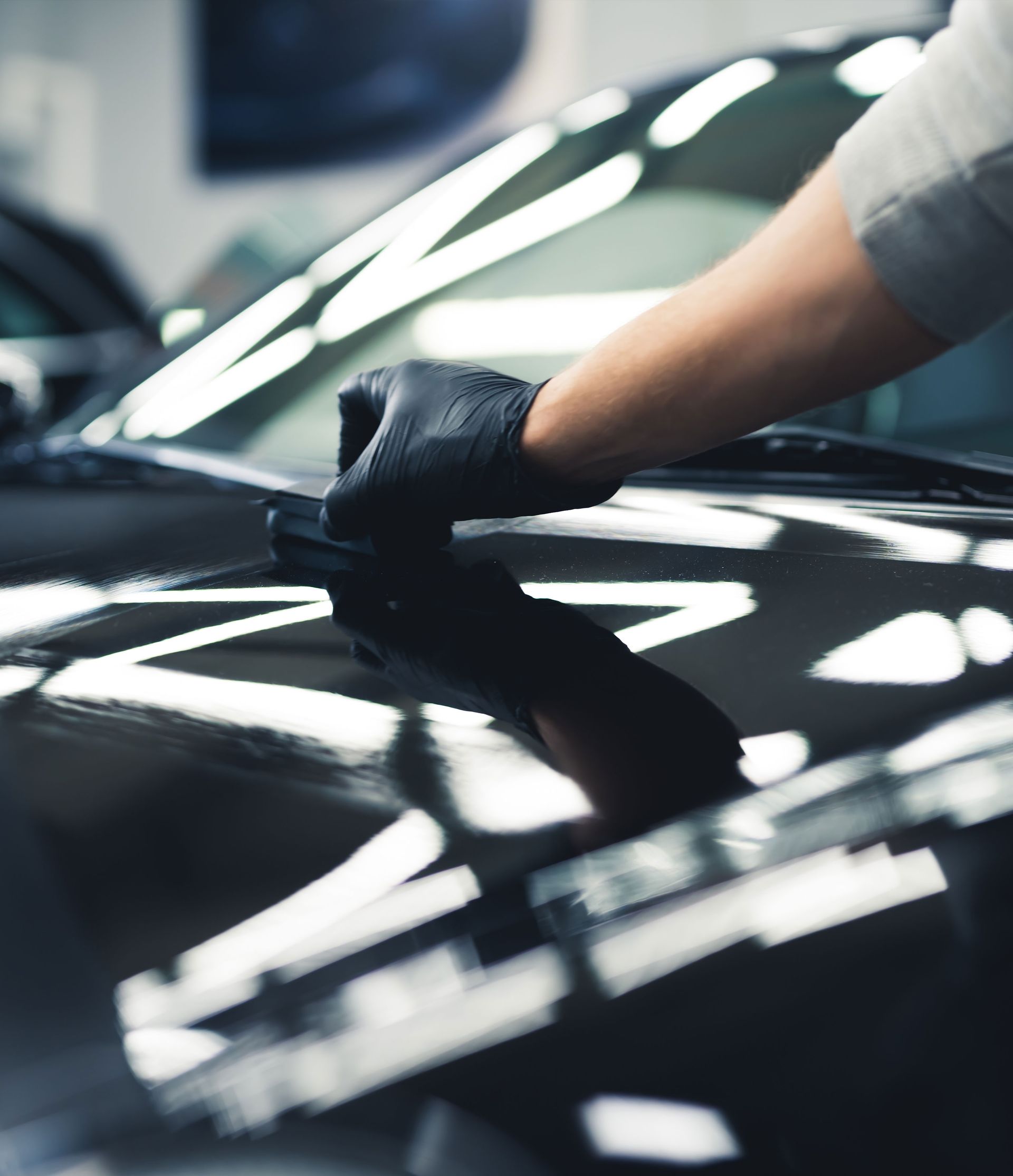 applying ceramic coating on a black car