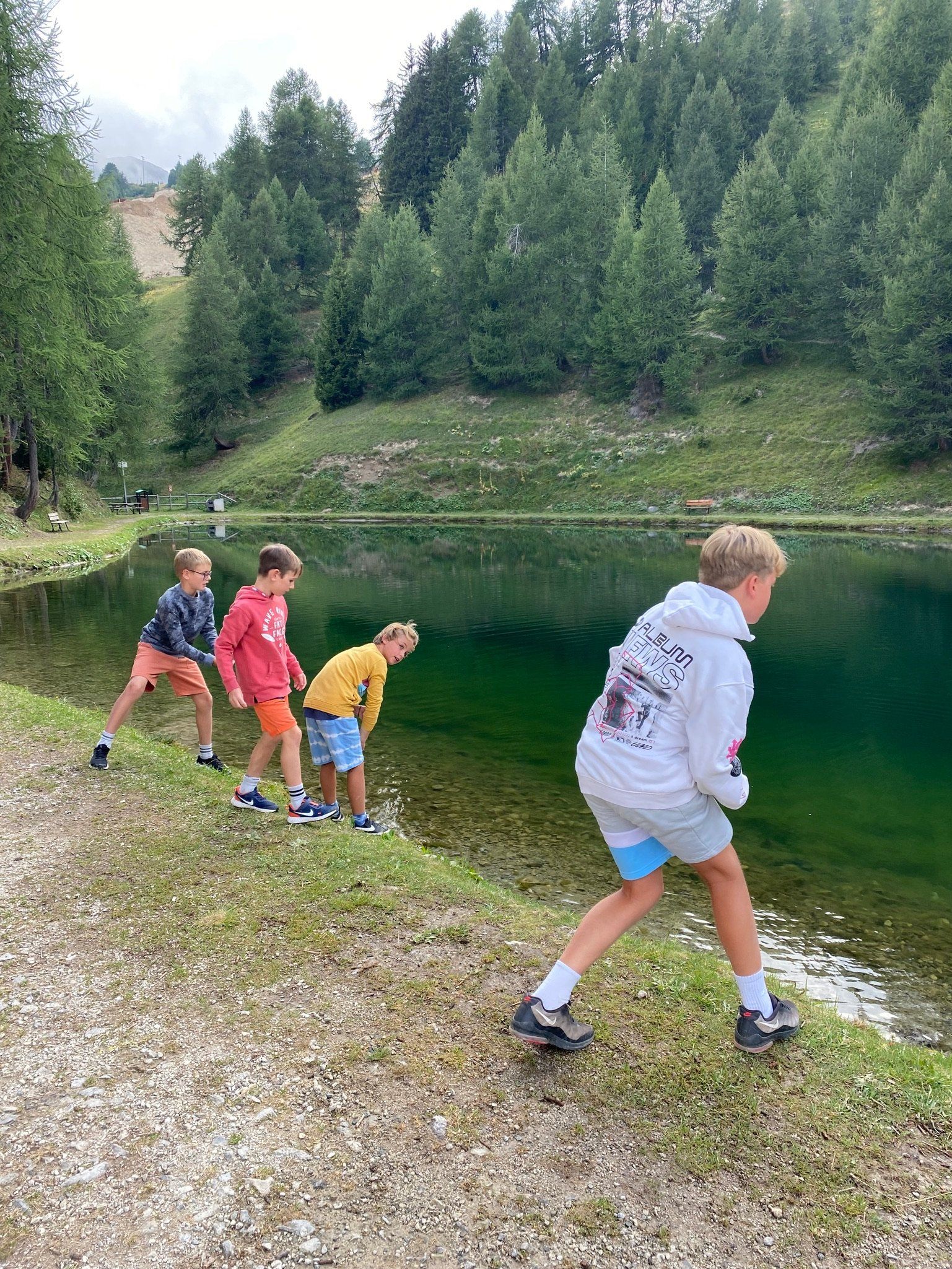 The Boys throwing Stones in Lac Vert
