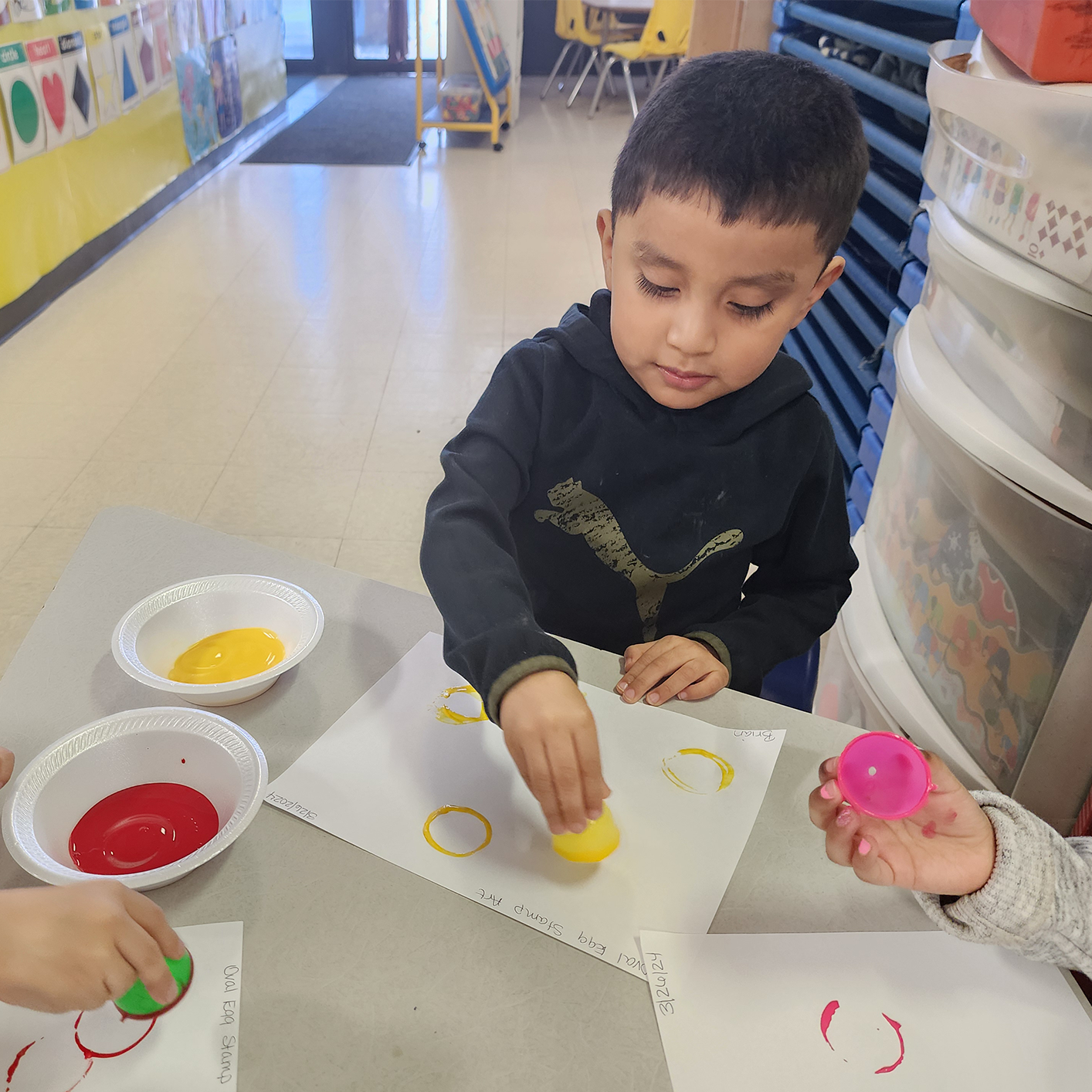 Child Care Columbus — Kindergarten Boy Playing with Colors in Columbus, OH