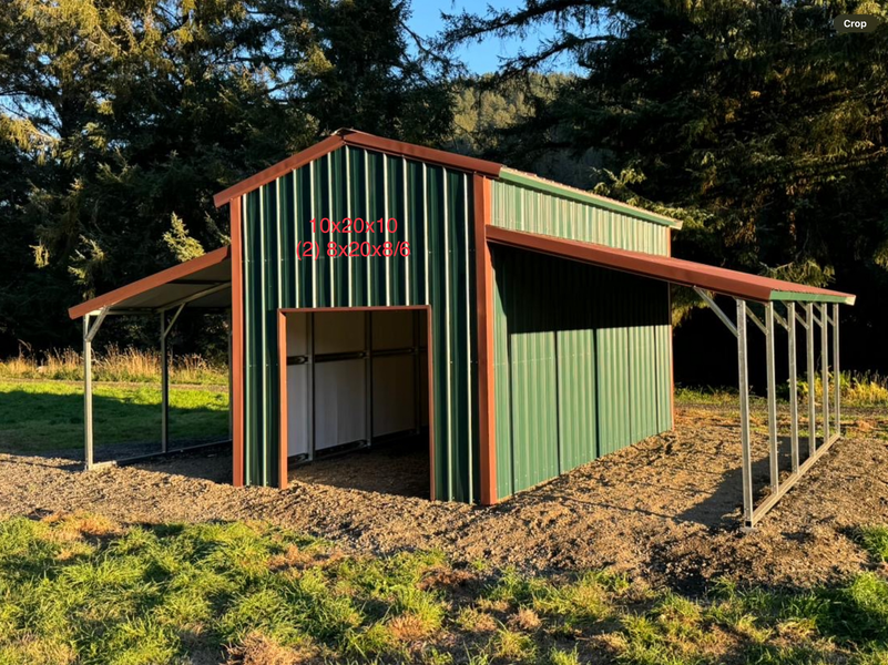 A green shed with a red roof and a sign that says ' shed ' on it.