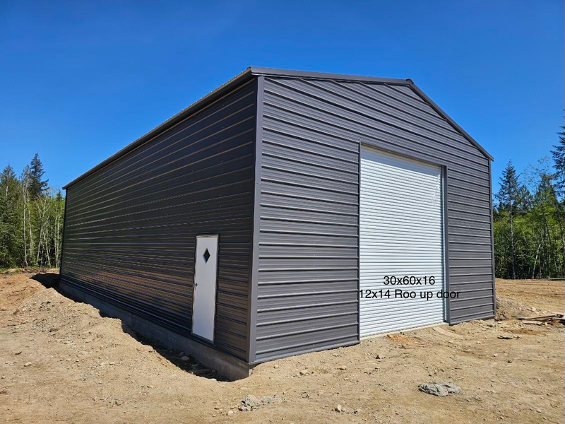 A red garage with a white door is in the backyard.