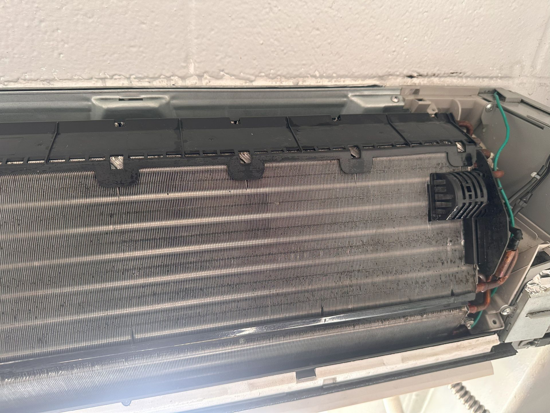 A close up of the inside of an air conditioner.