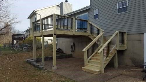 Deck on large grey house — Fenton, MO — SRP Home Improvement