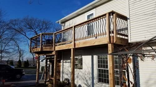 Nice tall deck with balcony on white house — Fenton, MO — SRP Home Improvement