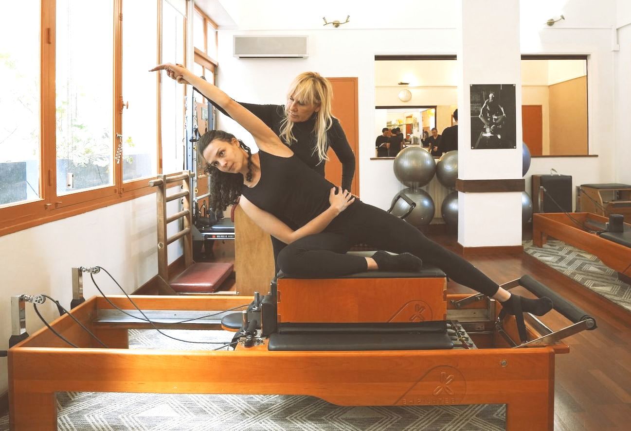 Pilates sur machine reformer Cadillac