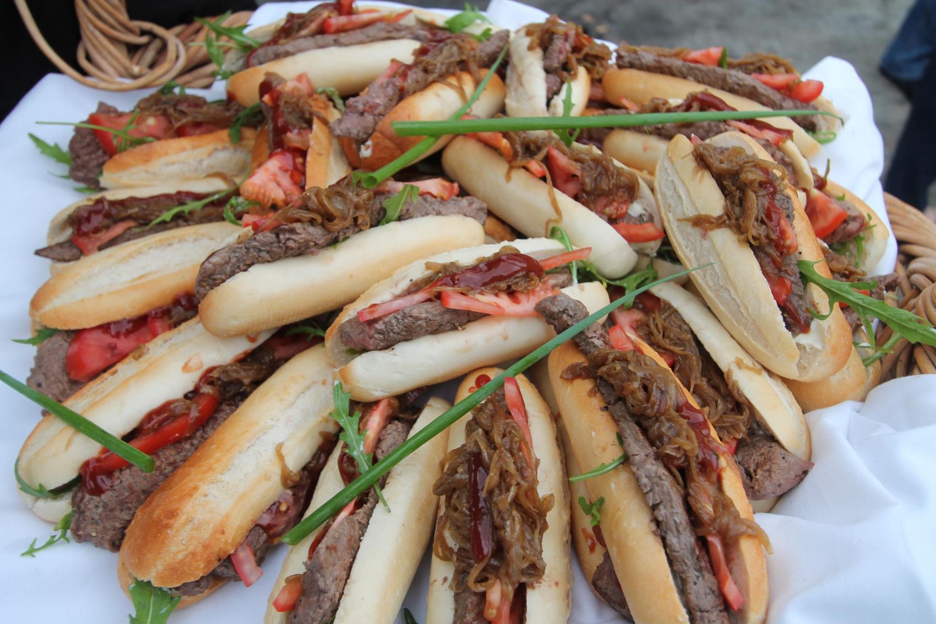 A large portion of rolls with steak and onions  — Amanda Douglass Catering Service in Corlette, NSW