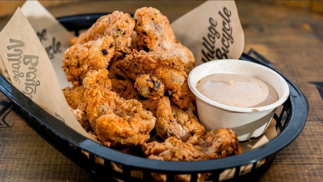 Basket of Fried Chicken Tenders With Dipping Sauce — Village Bicycle Noosa in Noosa Heads, QLD