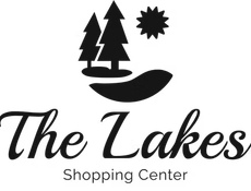 The Lakes Shopping Center logo with trees, sun, and a lake icon