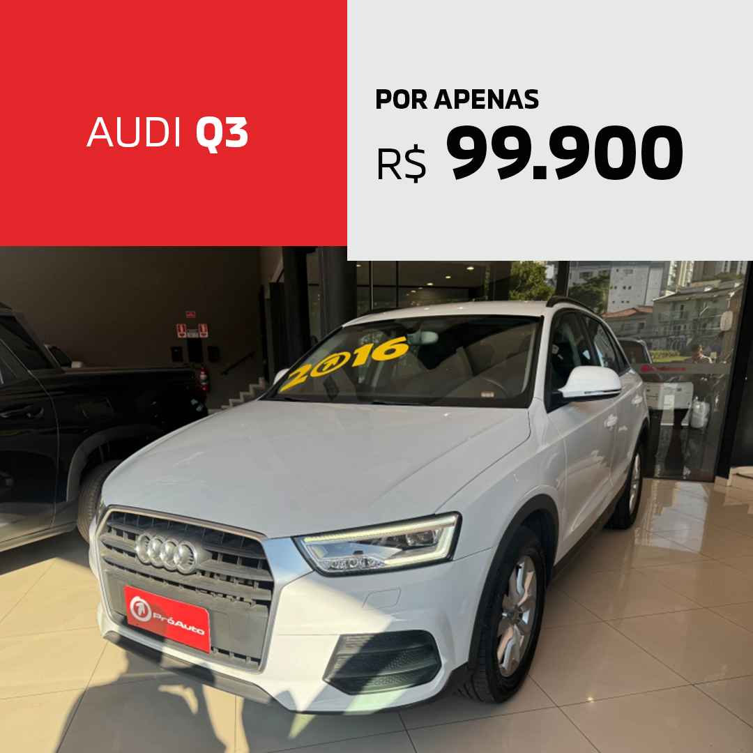 Um audi q3 branco está em um showroom