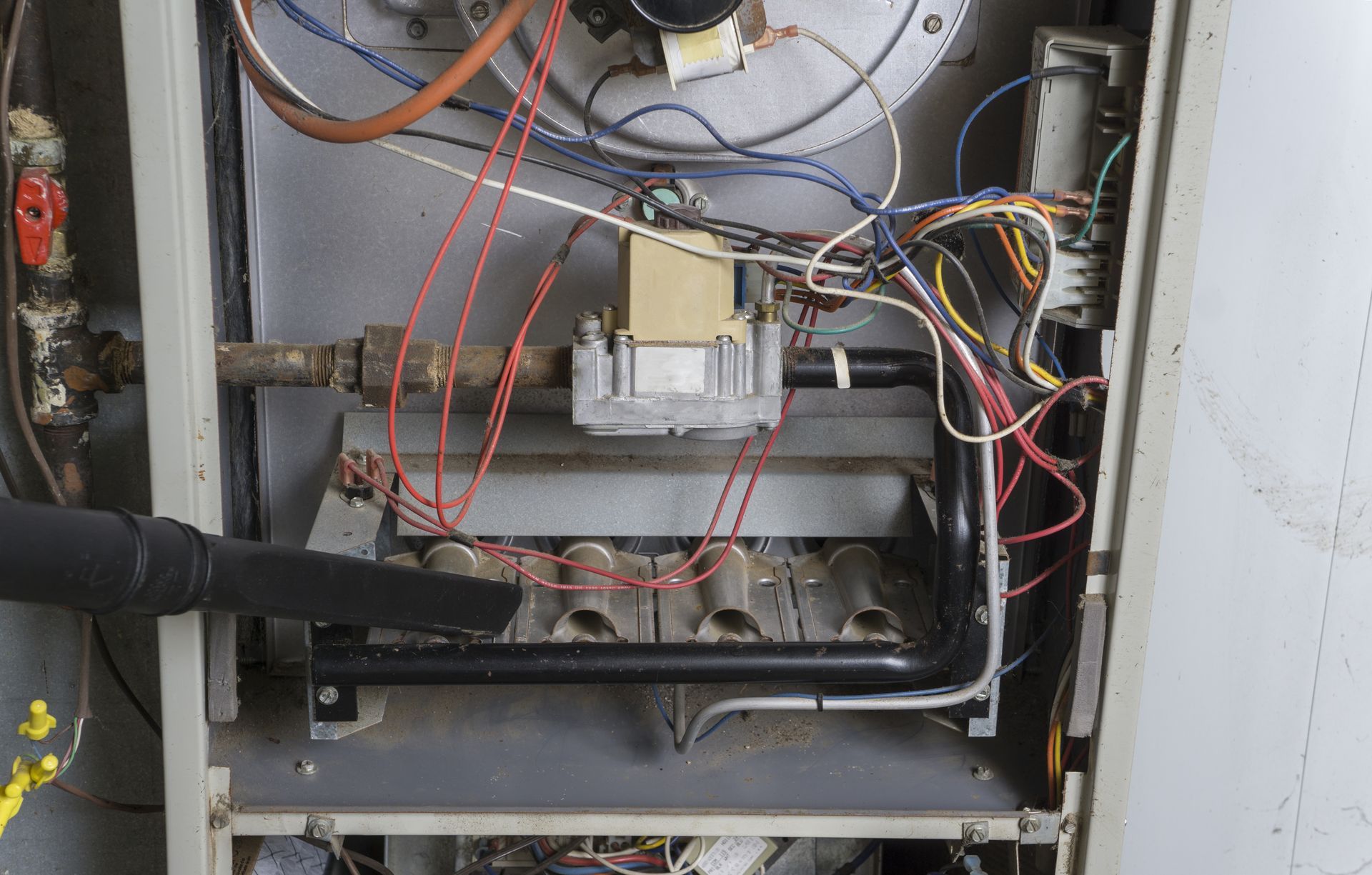 a close up of the inside of a heating system furnace