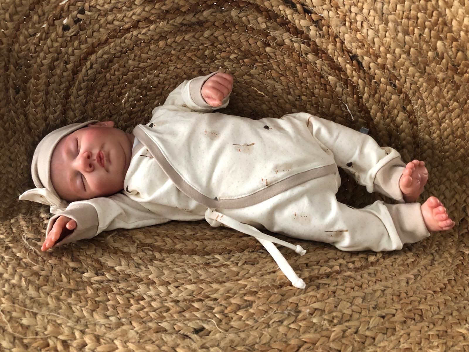 Prachtig overslagpakje met warme binnenzijde, mooi als kraamcadeau