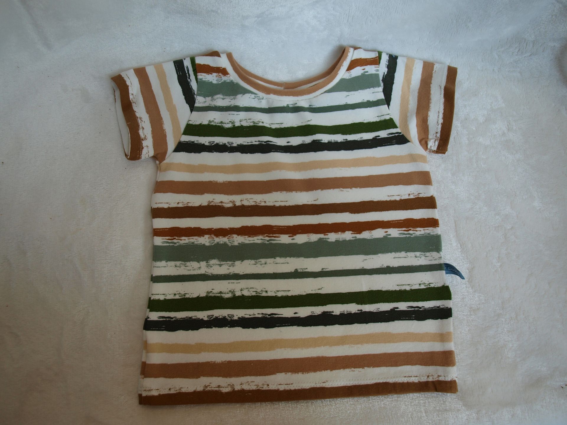 Vrolijk gestreept shirt  voor een baby van 6-9 maanden