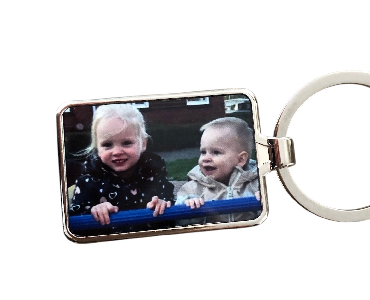 Foto van kleinkinderen op sleutelhanger laten bedrukken