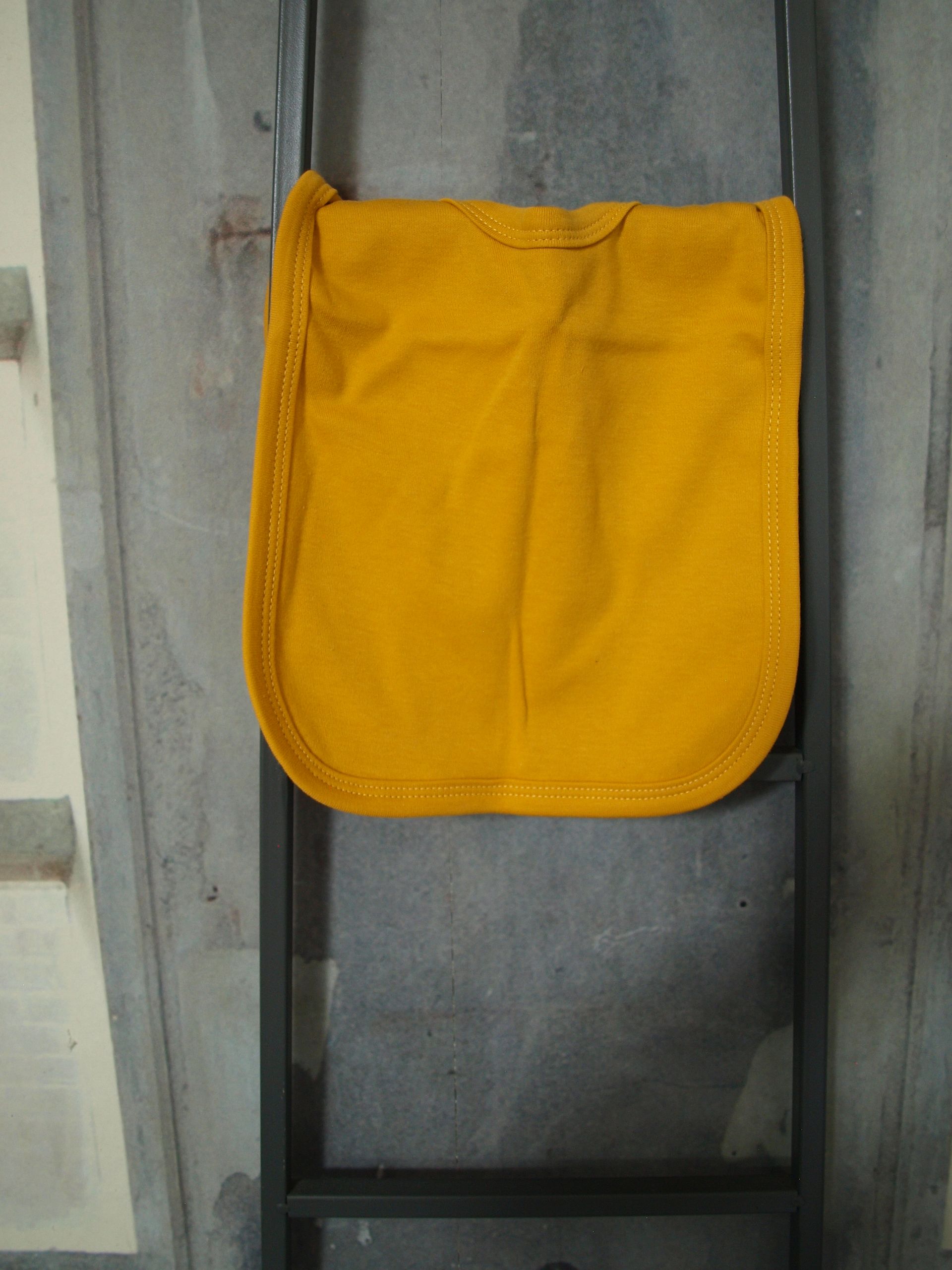 Een leuke afbeelding of tekst op een slabbetje