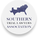 The logo for the southern trial lawyers association has a map of the united states on it.