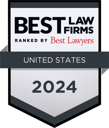 A badge that says `` best law firms ranked by best lawyers united states 2024 ''.