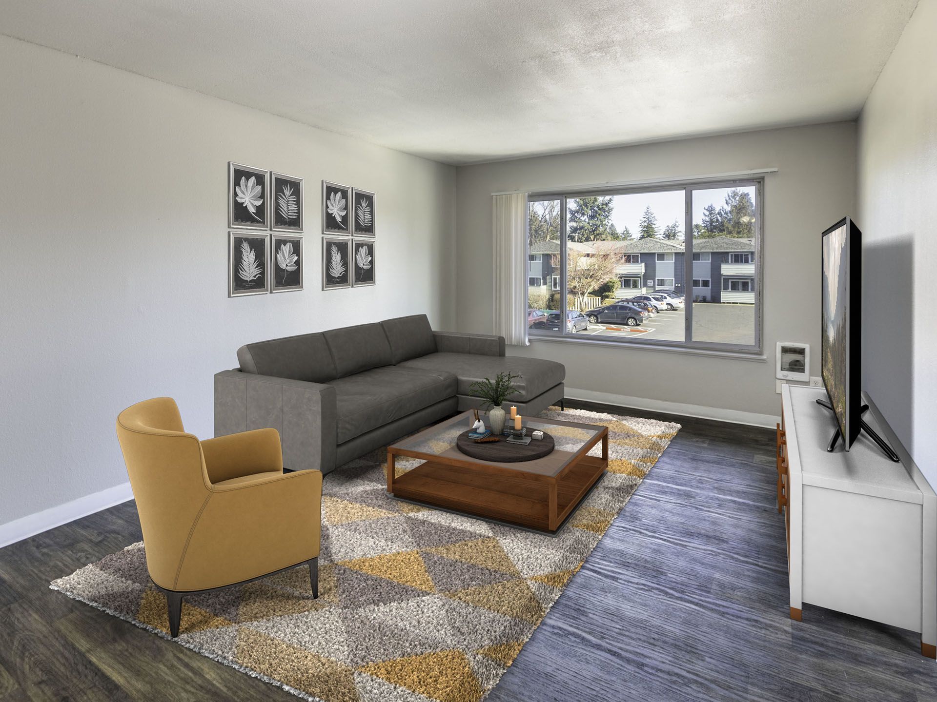 Photo of a living room showing a wide window for plenty of natural light