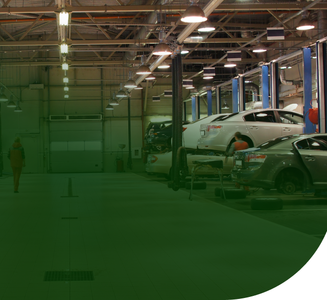 man walking in shop bay | Big Boyz Tire & Wheels